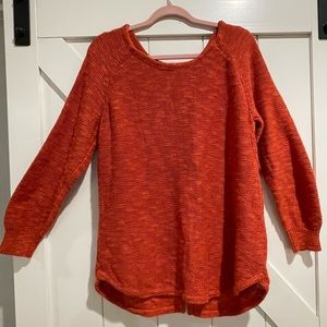 Sparrow orange sweater with back button detail, size L.